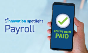 a hand holding a phone with a checkmark on the screen