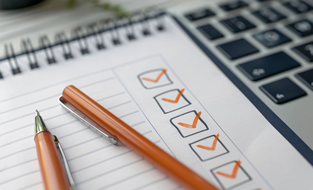 Close up of notebook with checklist