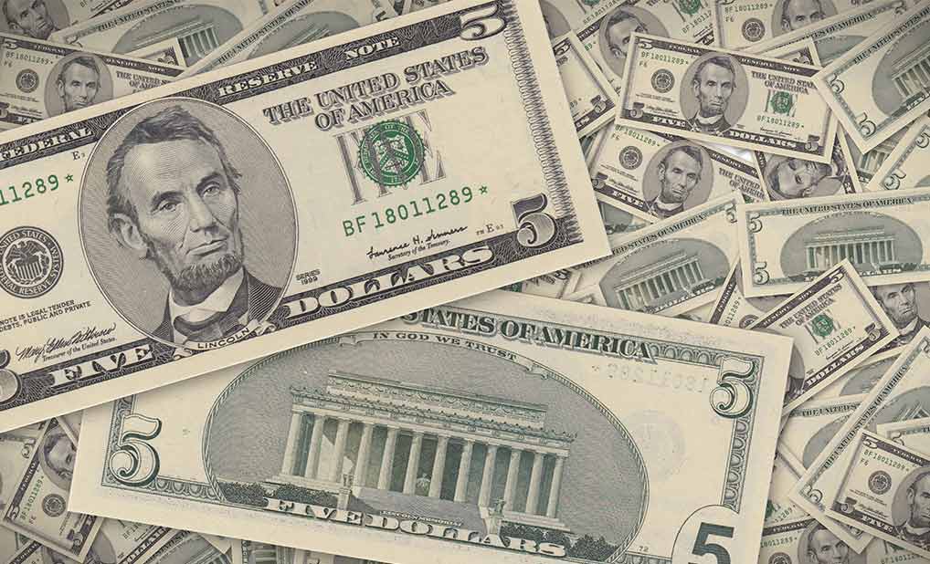 U.S. five dollar bills