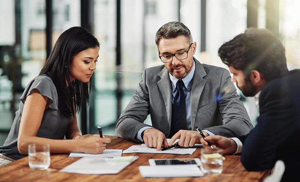 Group of people collaborating in office