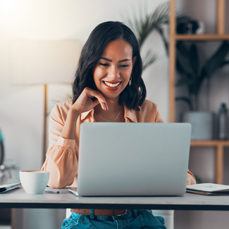 woman sitting at a laptop