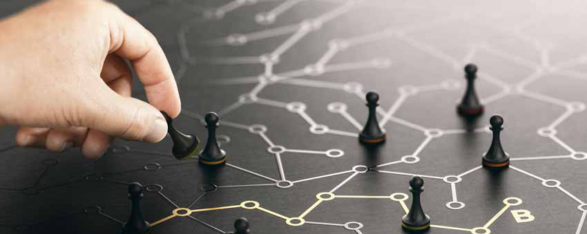 hand moving chess pawns