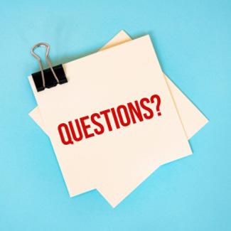 a post it note with the word 'questions?' written on it